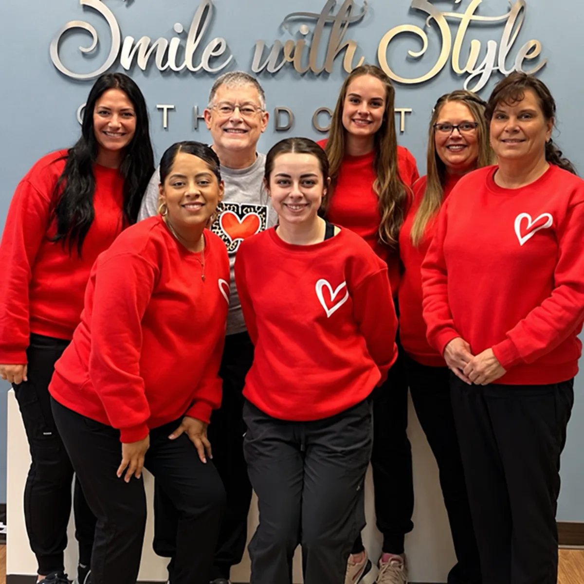 The Smile With Style team photographed together at the practice